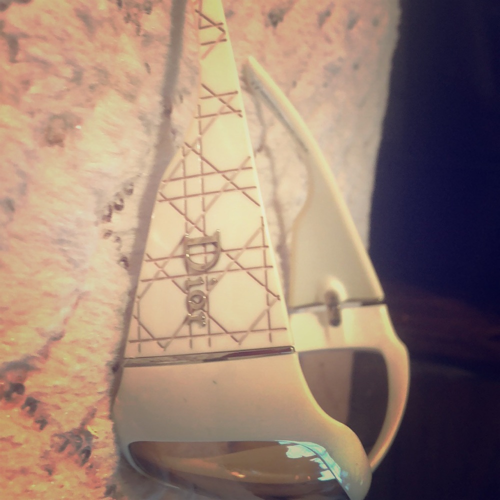 Dior sun glasses but I like them for snow ski or